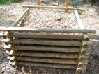 Compost heap made of  small trees