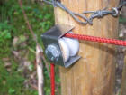 Pulley made from an electric fence insulator